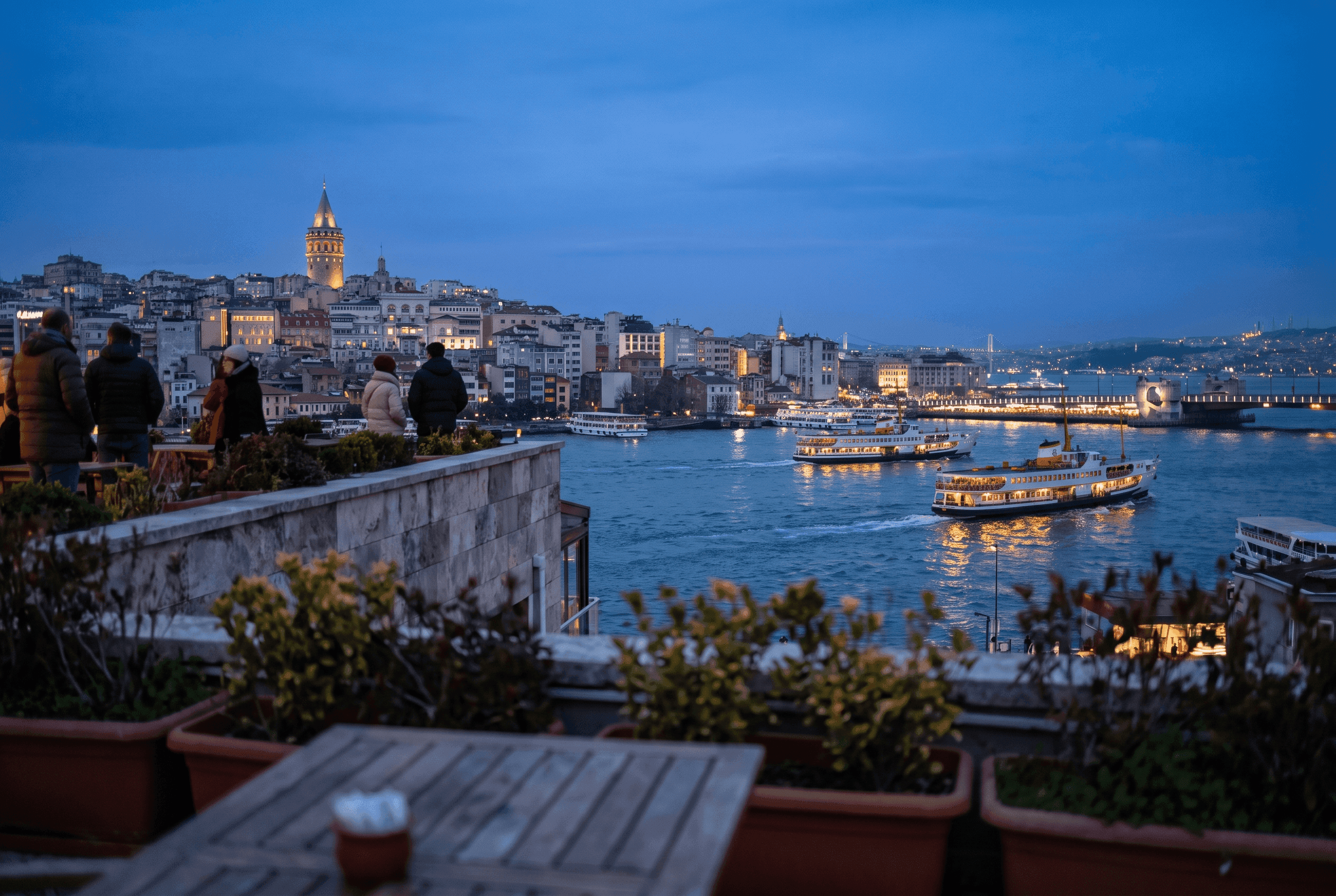 Galata Tower seen from a Karaköy rooftop at blue hour