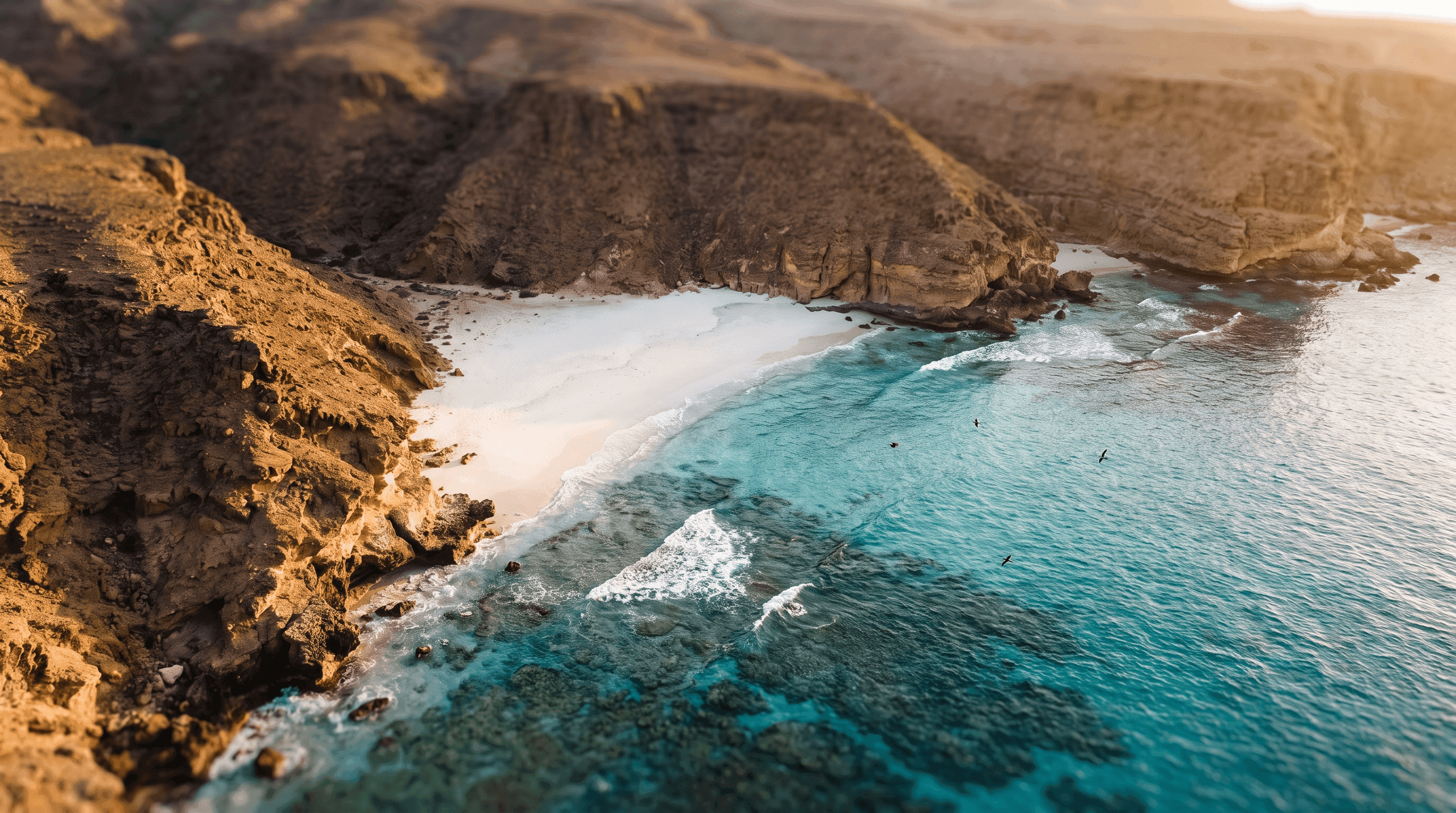 Turquoise water and white sand at Fazayah Beach west of Salalah